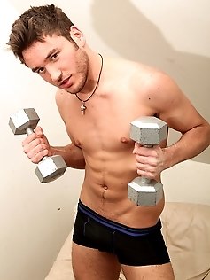 Scruffy and athletic boy Michael works out...
