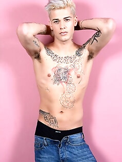 Young gay Mickey Taylor, demonstrates his inked...