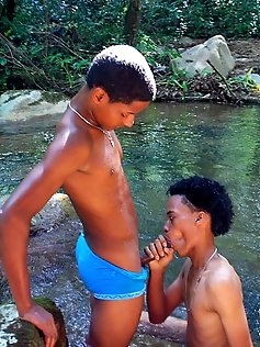 Horny Latin twinks in wet trunks giving a blowjob