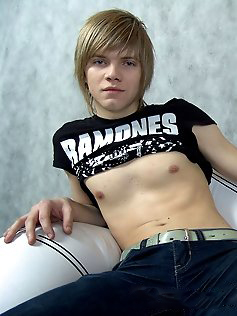 Skinny blond twink Raos takes to the couch and...