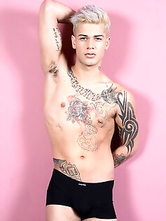 Young gay Mickey Taylor, demonstrates his inked...