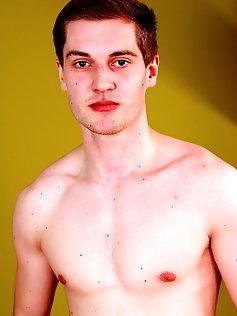 Finn Petrov blasts cum all over his sexy chest.